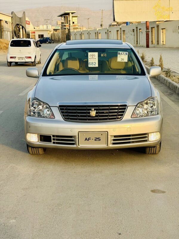 Toyota Axio Luxel 1.8: Impeccable condition with an ultra-low 13,000 KM original mileage and a verified 4.5 grade auction sheet. This 2008 model (Import 2012, Registered 2020 Sindh) is in full original paint. Features include Climate Control and upgraded Rims & Tyres, all in an elegant Golden finish.