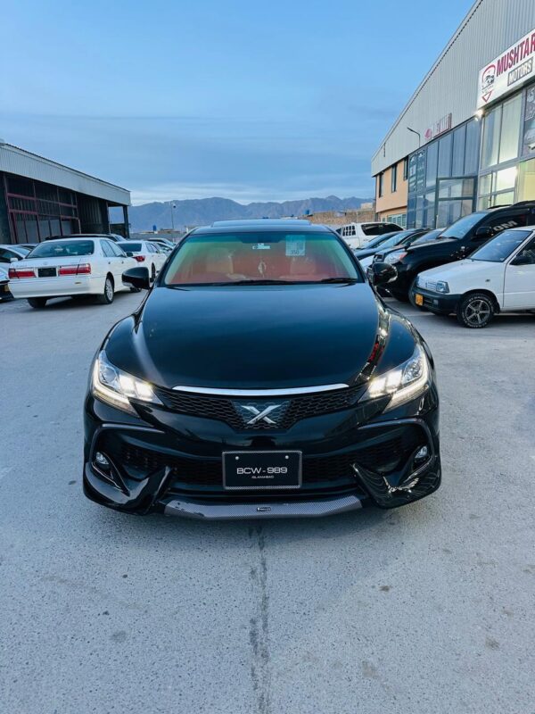 Toyota Mark X – Black Edition Mushtarka Motors Showroom 📅 Model Year: 2012 – 2019 (Example: 2016) 🎨 Color: Attitude Black Mica ⚙️ Engine Type: 2.5L V6 (4GR-FSE) / 3.5L V6 (2GR-FSE) 🔄 Transmission: 6-Speed Automatic with Paddle Shifters ⛽ Fuel Type: Petrol 📍 Registration City: Karachi / Islamabad / Lahore / NCP 📏 Mileage: 40,000 – 85,000 km 🪑 Interior: Black / Beige Leather Upholstery Electric & Heated Seats Wooden Trim + Soft-Touch Dashboard Steering Wheel Controls Smart Key + Push Start ☀️ Sunroof: Yes (Electric Tilt & Slide) ❄️ Climate Control: Dual-Zone Automatic 🔈 Infotainment System: Touchscreen Multimedia Display Navigation + Bluetooth + Reverse Camera Premium Sound System 🚗 Drive Type: Rear Wheel Drive (RWD) 💡 Headlights: HID Projectors with LED DRLs 🛞 Wheels: 17/18-inch Alloy Rims with Low Profile Tyres 🧭 Safety Features: ABS + EBD + Traction Control Airbags (Driver + Passenger + Curtain) Cruise Control Rear Camera + Parking Sensors 🧾 Condition: Showroom maintained, scratchless exterior, smooth suspension, excellent engine performance, and clean luxury interior.